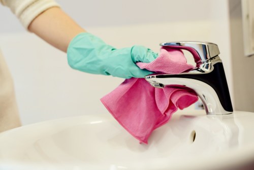 Office cleaning team working in an E5 workplace reception area