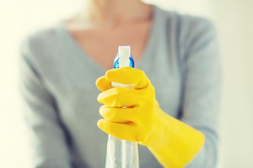 Carpet cleaning team following safe working procedures