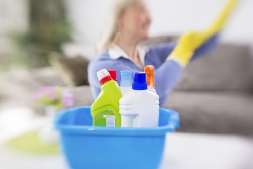 Carpet cleaning technician preparing equipment and solutions
