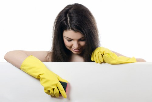 Local floor cleaning team working on a hard floor surface in E5